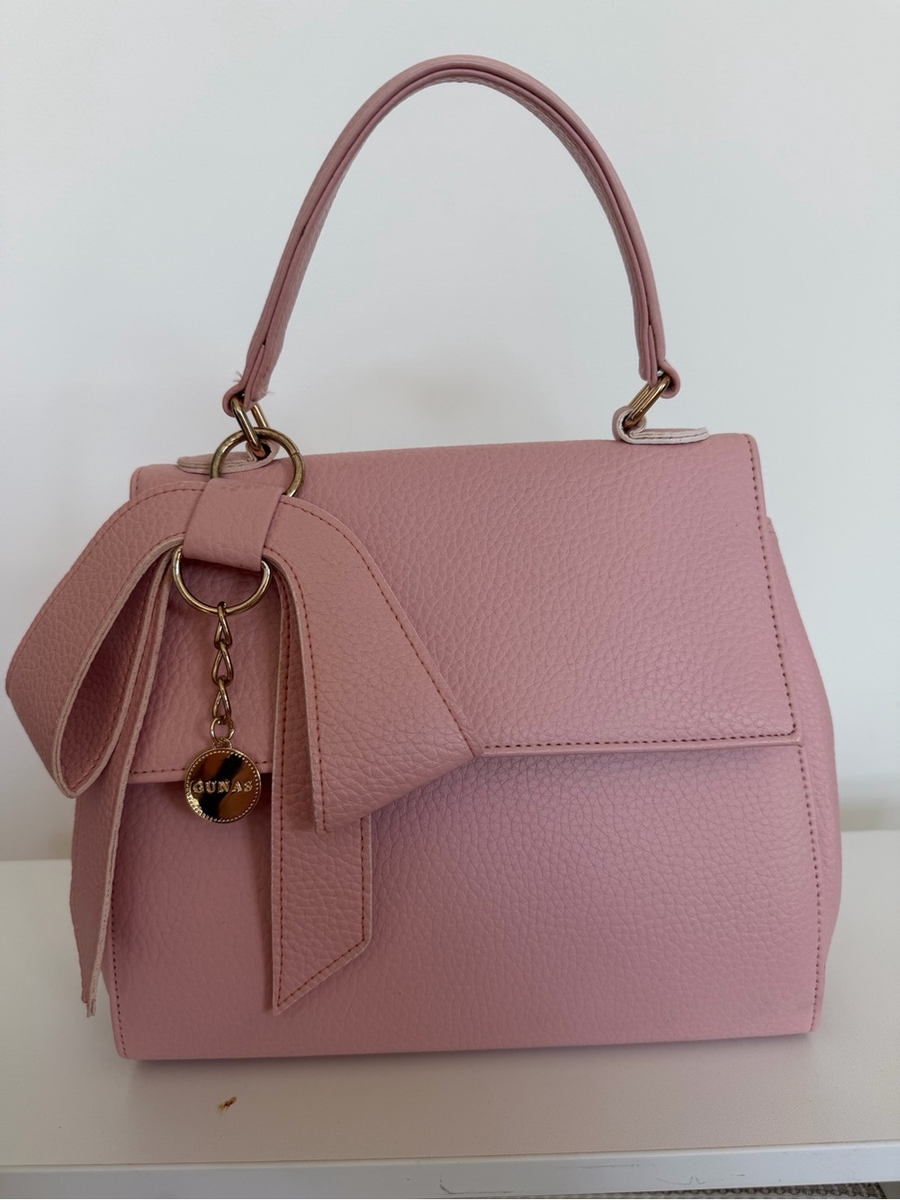 Eco-Friendly Elegant Pink Top-Handle Satchel with Bow Accent $91